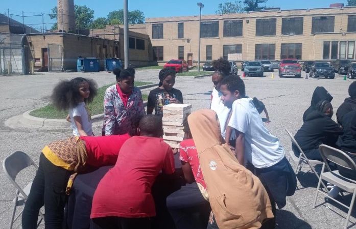 students playing jenga together